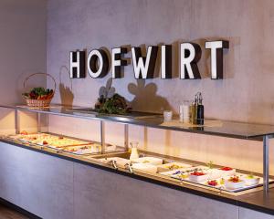 a buffet line with many different types of food at Altstadt Hotel Hofwirt Salzburg in Salzburg