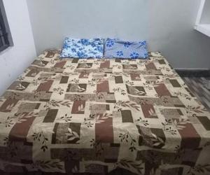 Postel nebo postele na pokoji v ubytování Mahi Home Stay