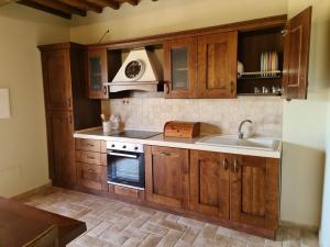 Køkken eller tekøkken på Agriturismo Il Bagnano