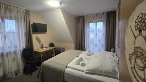 Postel nebo postele na pokoji v ubytování Hotel-Gasthof "Alter Ritter"