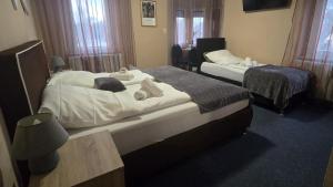 Postel nebo postele na pokoji v ubytování Hotel-Gasthof "Alter Ritter"