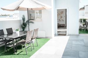 Patio nebo venkovní prostory v ubytování NYA Boutique Suite