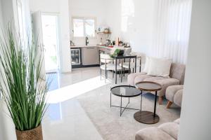 Kuchyň nebo kuchyňský kout v ubytování NYA Boutique Suite