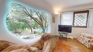 Μια τηλεόραση ή/και κέντρο ψυχαγωγίας στο Villa Abbaiola - Porto Cervo Marina