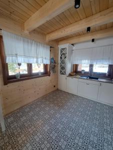 Kuchyň nebo kuchyňský kout v ubytování Willa Marmolada