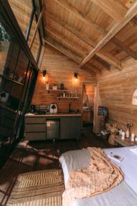 Η κουζίνα ή μικρή κουζίνα στο Onirico Refugio +18 φωτογραφίες