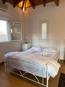 Postel nebo postele na pokoji v ubytování Pool Guesthouse