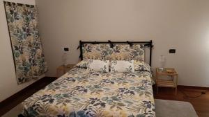 Postel nebo postele na pokoji v ubytování La Corte Guesthouse