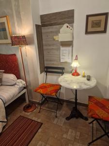 Postel nebo postele na pokoji v ubytování B&B La Riva del Po Camera indipendente
