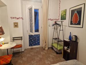 Postel nebo postele na pokoji v ubytování B&B La Riva del Po Camera indipendente