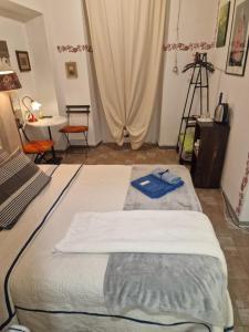 Postel nebo postele na pokoji v ubytování B&B La Riva del Po Camera indipendente