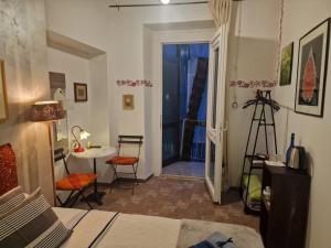 Postel nebo postele na pokoji v ubytování B&B La Riva del Po Camera indipendente