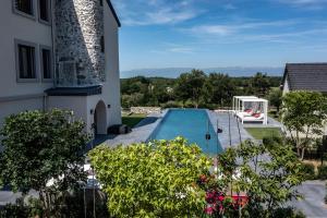 an image of a swimming pool in a house at Chateau De Neydens in Saint-Cergues