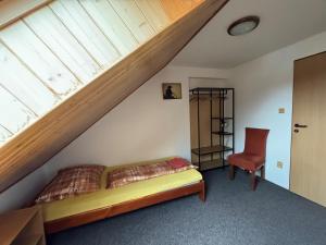 Postel nebo postele na pokoji v ubytování Penzion Na Majlantě