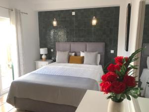 Ένα ή περισσότερα κρεβάτια σε δωμάτιο στο Casa GiGi