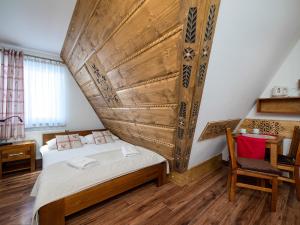 Posteľ alebo postele v izbe v ubytovaní Willa Pod Reglami Małe Ciche Sauna & Jacuzzi