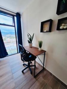 TV a/nebo společenská místnost v ubytování Monoambiente en Distrito Artemisa