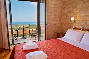 Postel nebo postele na pokoji v ubytování Enastron Villas + 37 fotografií