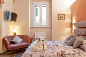 Postel nebo postele na pokoji v ubytování Torretta10 - Casa Vacanze a Livorno