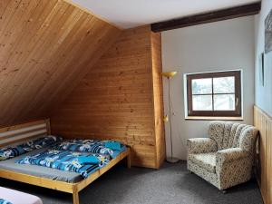 Postel nebo postele na pokoji v ubytování Penzion Na Majlantě