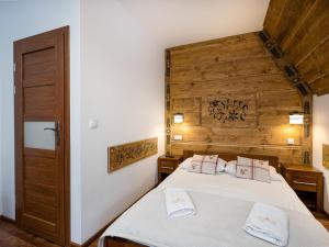 Posteľ alebo postele v izbe v ubytovaní Willa Pod Reglami Małe Ciche Sauna & Jacuzzi