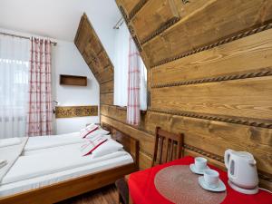 Posteľ alebo postele v izbe v ubytovaní Willa Pod Reglami Małe Ciche Sauna & Jacuzzi