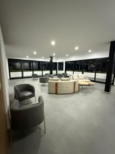 Posezení v ubytování Paradise Apartment at Gallerias Escalon + 65 fotografií