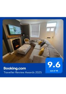 En eller flere senge i et værelse på Free Parking, Outdoor Decking - Flanders Cottage