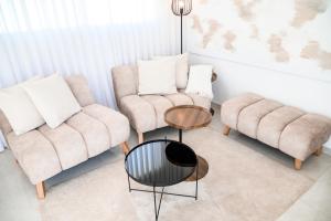 Posezení v ubytování NYA Boutique Suite