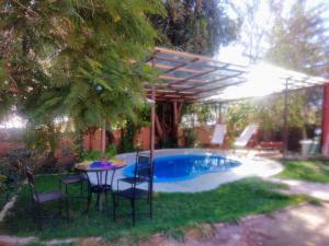 Bazén v ubytování Cabaña en Valle de Elqui nebo v jeho okolí