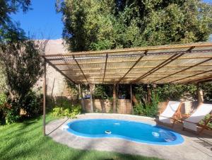 Bazén v ubytování Cabaña en Valle de Elqui nebo v jeho okolí