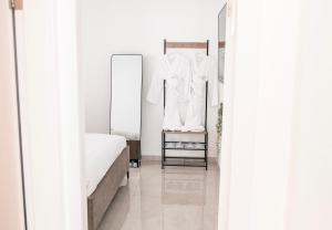 Postel nebo postele na pokoji v ubytování NYA Boutique Suite