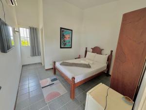 Postel nebo postele na pokoji v ubytování Casa Beira-Mar em Guadalupe + 43 fotografií