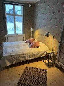 Postel nebo postele na pokoji v ubytování STF Tre Björnar B&B