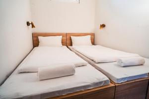 Postel nebo postele na pokoji v ubytování Siocamping Házak Homes