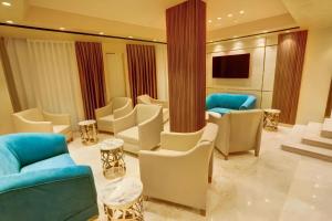 Телевизор и/или развлекательный центр в Turquoisejo Hotel