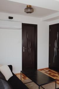 Posezení v ubytování DOUX Apartman