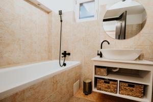 Koupelna v ubytování DOUX Apartman