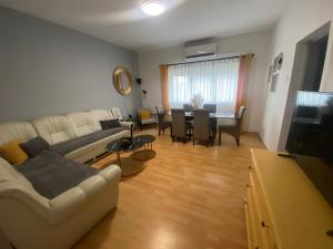 Posezení v ubytování Apartment and rooms EL