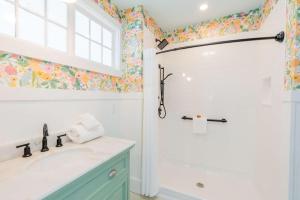 a bathroom with a sink and a shower at Ocean House Boutique Hotel & Motel in Old Orchard Beach +129 photos