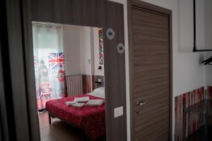 Postel nebo postele na pokoji v ubytování Coco'S Rooms