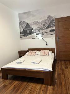 Posteľ alebo postele v izbe v ubytovaní Willa Pod Reglami Małe Ciche Sauna & Jacuzzi