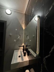 Koupelna v ubytování Sountou home + 37 fotografií