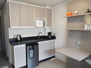 Kuchyň nebo kuchyňský kout v ubytování Loft Xangrilá + 8 fotografií