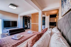 Ένα ή περισσότερα κρεβάτια σε δωμάτιο στο Dedaj Resort - Villa Delux