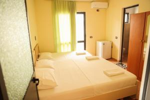 Postel nebo postele na pokoji v ubytování Haka Guesthouse