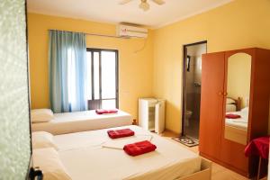Postel nebo postele na pokoji v ubytování Haka Guesthouse