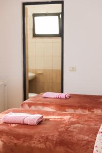 Postel nebo postele na pokoji v ubytování Haka Guesthouse