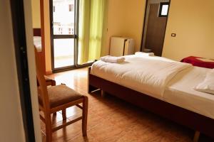 Postel nebo postele na pokoji v ubytování Haka Guesthouse