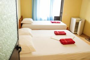 Postel nebo postele na pokoji v ubytování Haka Guesthouse